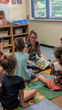Free Classroom Reading Time Image - Teacher, Children, Reading ...